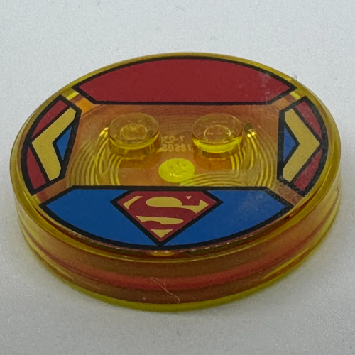 Function Brick Round 4 × 4 × 2/3 with 2 Studs and Yellow and Red Supergirl Logo Print Transparent-Gelb