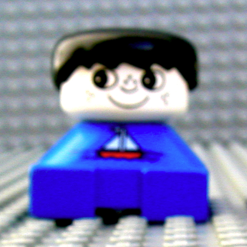 Duplo 2 × 2 × 2 Figure Brick, Spiky Bangs, White Heads, Black Hair, Sailboat Print Blue