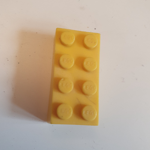 Brick 2 × 4 with Old Logo on Studs and without Cross Supports Yellow