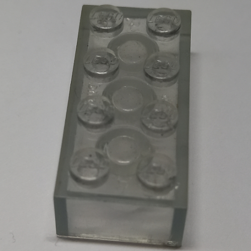 Brick 2 × 4 with Old Logo on Studs and without Cross Supports Transparent