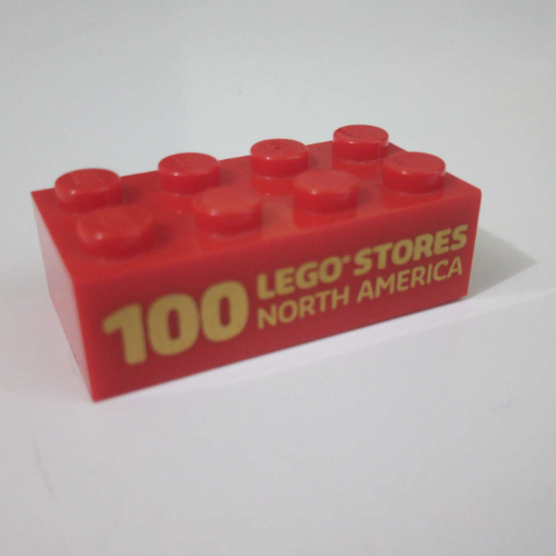 Brick 2 × 4 with '100 LEGO Stores North America' print Red
