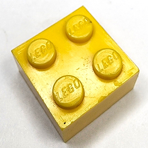 Brick 2 × 2 without Inside Support or Tubes Yellow