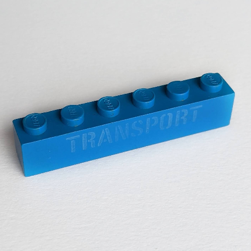 Brick 1 × 6 with 'TRANSPORT' Stencil White Print