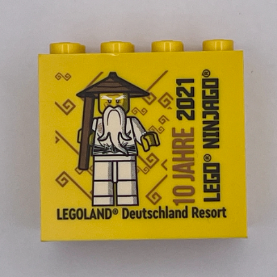 Brick 2 × 4 × 3 with 'LEGOLAND Deutschland Resort' and '10 JAHRE 2021 LEGO NINJAGO' Print Yellow