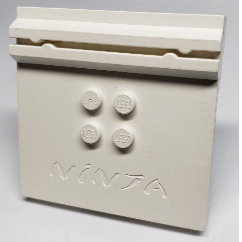 Plate Special 6 × 6 × 2/3 with 4 Studs and Embossed 'Ninja' White