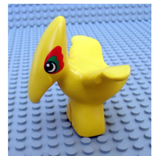 Duplo Dinosaur Pteranodon Baby with Green and Red Around Eyes Print Yellow