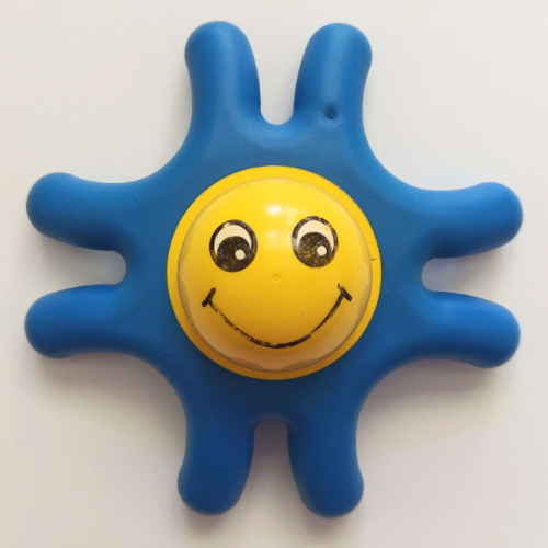 Primo Teether Star with 8 Arms, Yellow Center and Face Print Rot