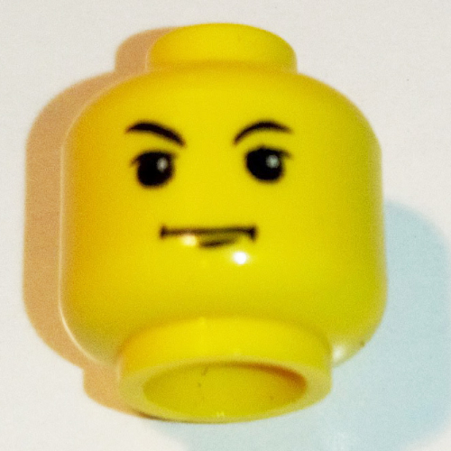 Minifig Head Tom Riddle (Voldemort), White Pupils, Arched Right Brow, Chin Dimple Print [Blocked Open Stud] Yellow
