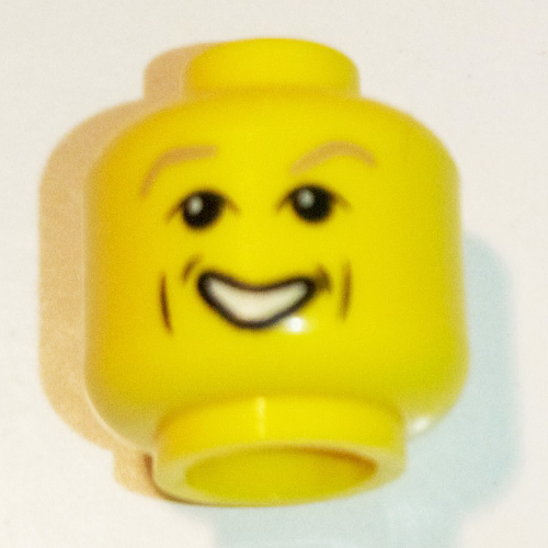Minifig Head Professor Gilderoy Lockhart, Light Brown Eyebrows, Cheek Dimple, Open Mouth Smile Print [Blocked Open Stud] Gelb
