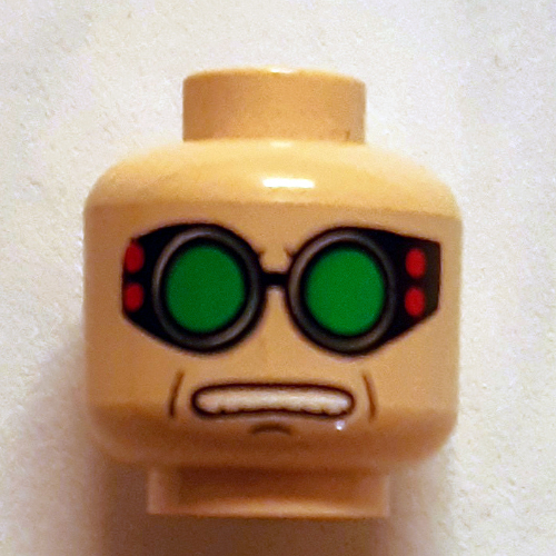 Minifig Head Dr Octopus (Doc Ock), Green Goggles, Brown Arched Eyebrows, Open Mouth Print Light Nougat