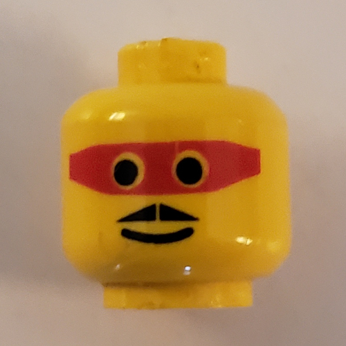 Minifig Head, Mask Red with Eyeholes and Moustache Print Gelb