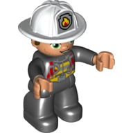 Duplo Figure with Helmet, Black Legs, Black Jacket with Red Safety Harness, White Helmet with Silver Fire Badge, Green Eyes, Stubble (Firefighter) Black