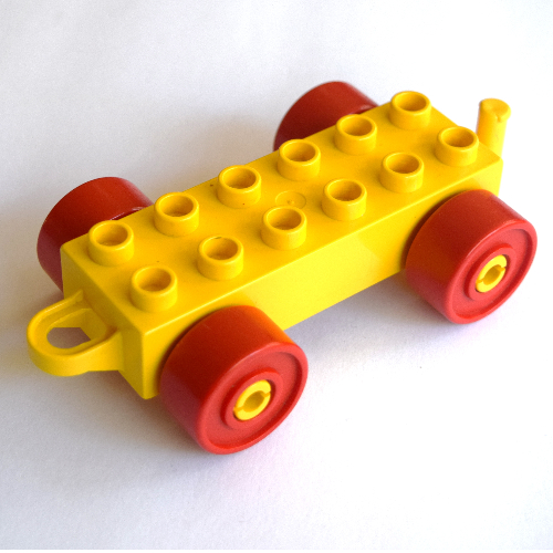 Duplo Car Base 2 × 6 with Red Wheels and Old Style Closed Hitch End Yellow