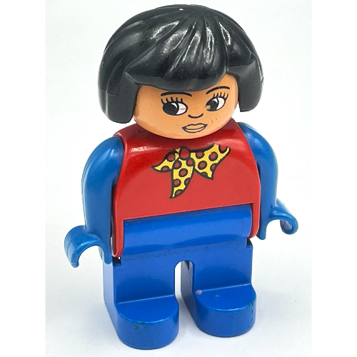 Duplo-Figur, früh, Haare Bob schwarz, blaue Beine und Arme, gelber Schal mit roten Punkten, weiße Augen (bedruckt) in Rot