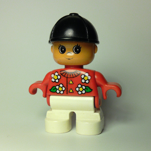 Duplo Figur, Kleinkind, mit schwarzem Helm, weiße Beine, weiße Blumen (bedruckt) in Rot
