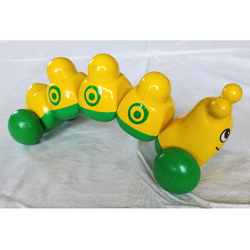 Primo Caterpillar with Green Wheels, Circles print Gelb