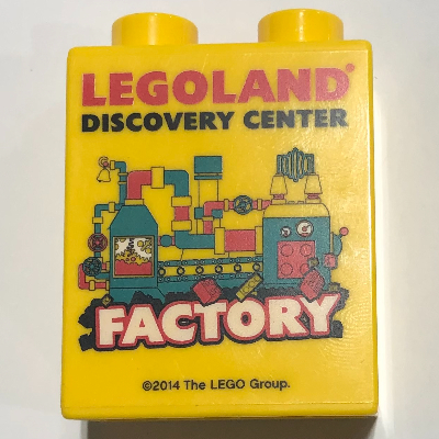 Duplo Brick 1 × 2 × 2 with Bottom Tube, 'LEGOLAND DISCOVERY CENTER FACTORY' 2014 Print Gelb