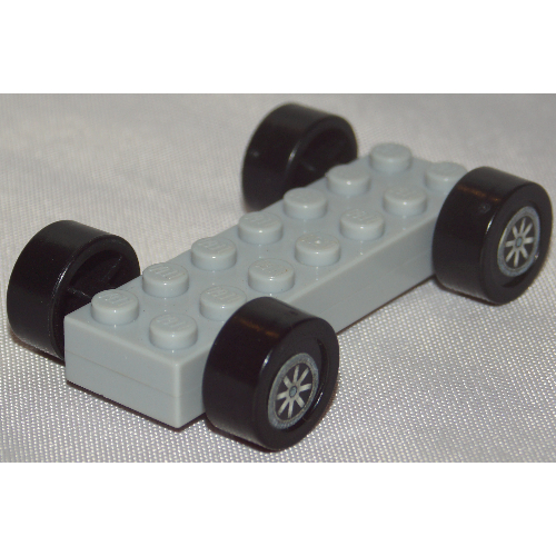 Vehicle Base Fast Food Racer 2 × 7 × 2/3 with Black Wheels, Slicks Hellblaugrau
