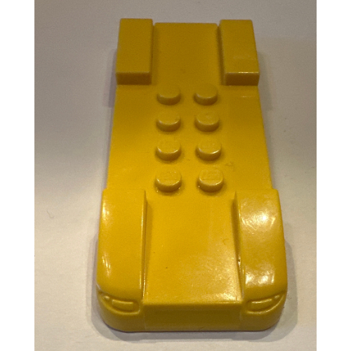 Vehicle Base, 4 × 10, 8 top studs and 2 headlights Yellow