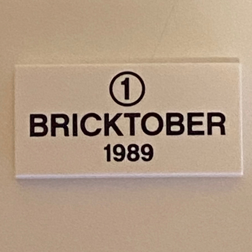 Tile 2 × 4 with '1' in Circle, 'BRICKTOBER 1989' print White