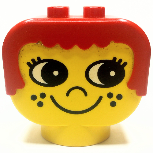 Duplo Kopfstein mit roten Haaren und Sommersprossen in Gelb