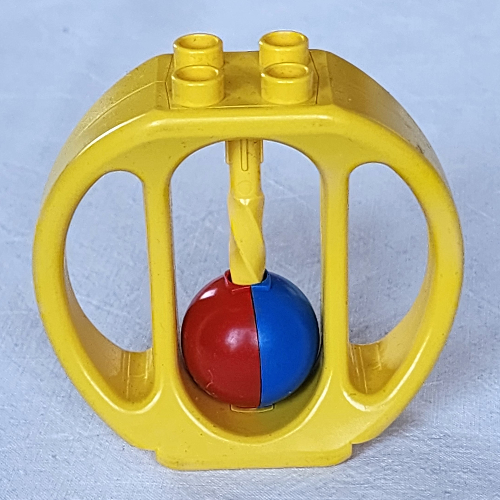 Duplo Rattle Oval with Red and Blue Ball Wheel Gelb